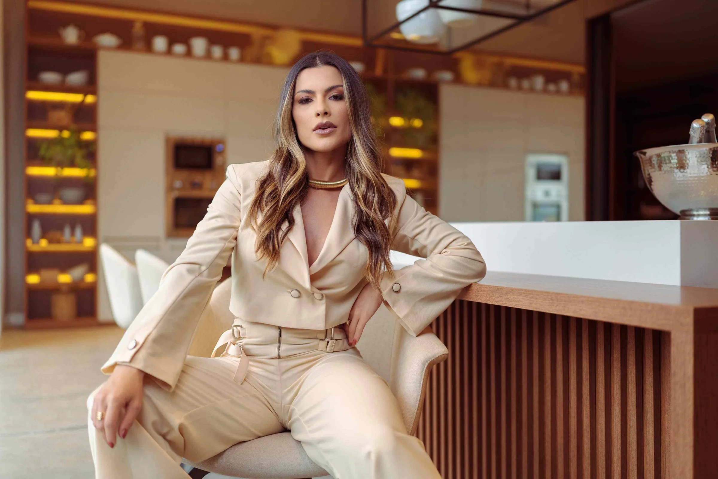Fashion session with light-colored tailoring in a warm-toned setting